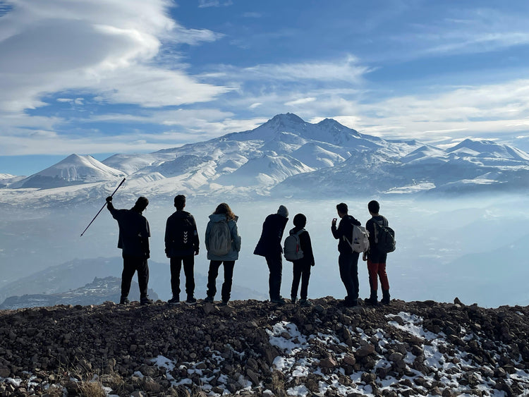 Group of friends hiking a mountain